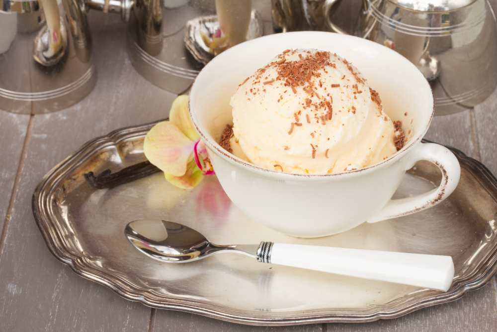 scoop ice cream with N2O whipped cream